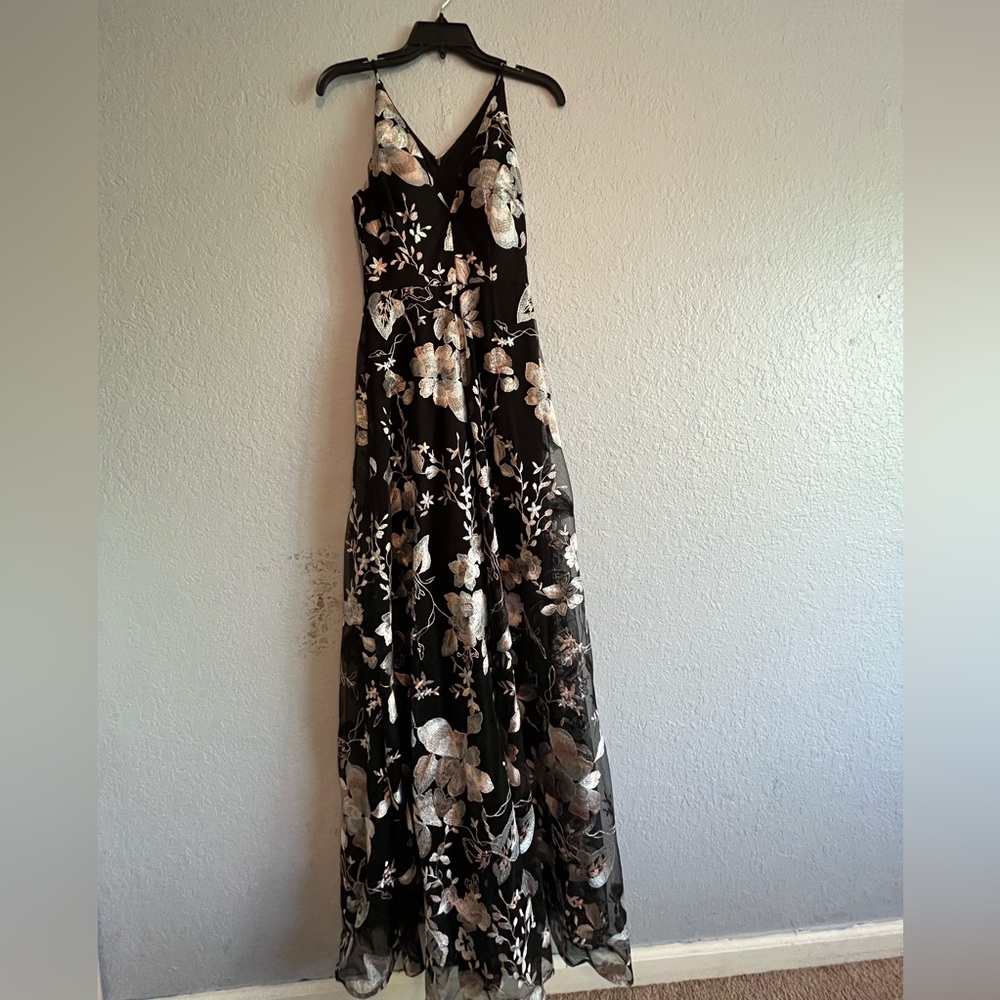Formal dress size zero. Bought at Bloomingdale’s never worn tags on.
